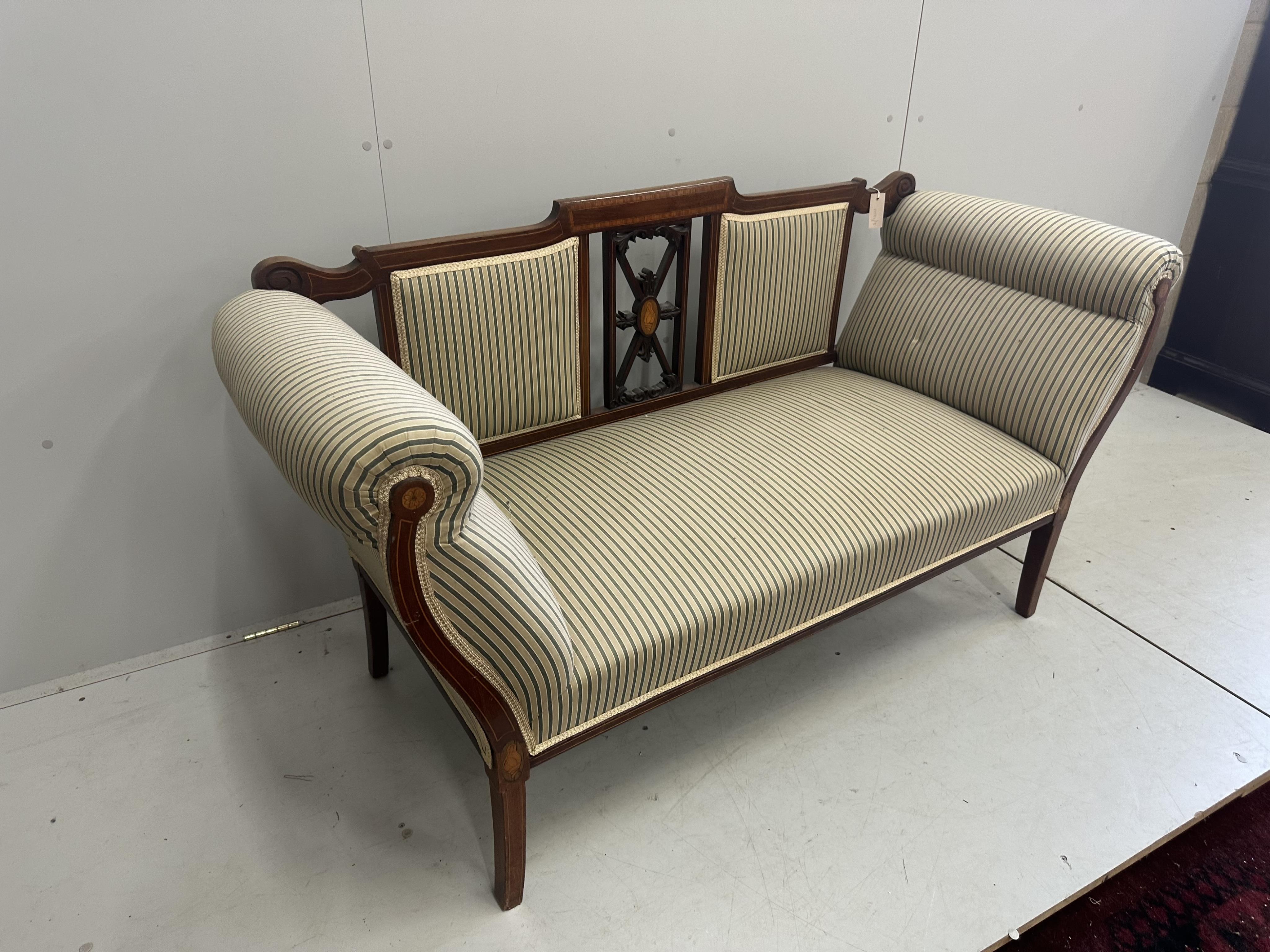 An Edwardian inlaid mahogany settee, width 150cm, depth 60cm, height 84cm. Condition - fair